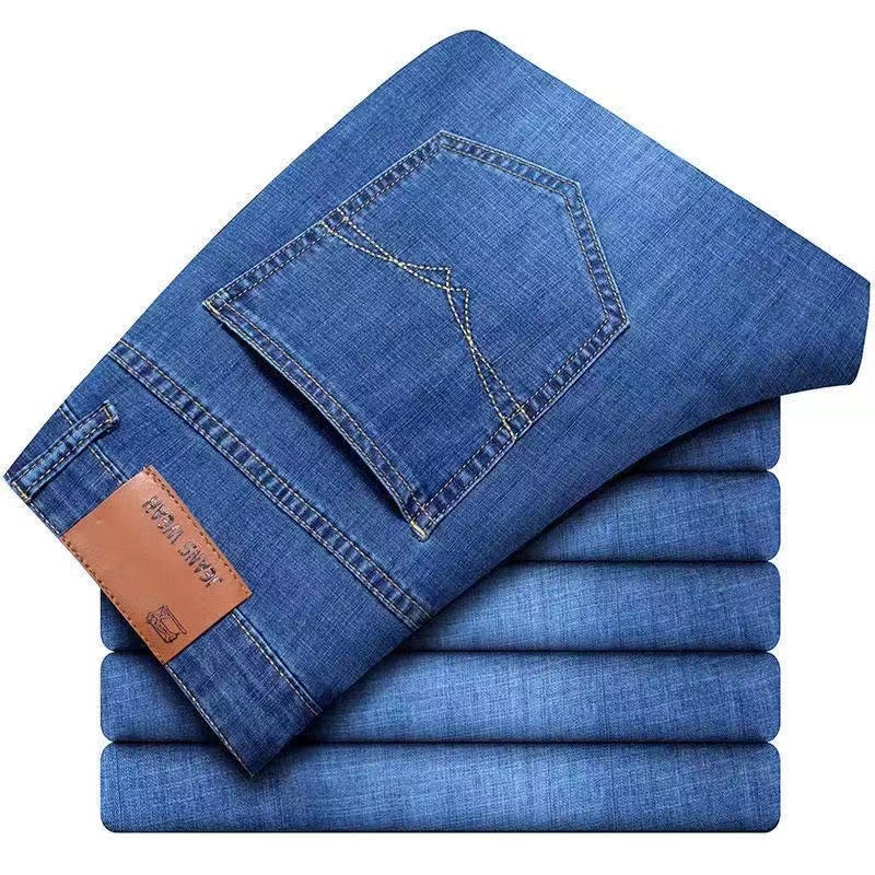 Summer men's elastic jeans for construction work, loose-fitting straight-leg casual and versatile durable trousers.