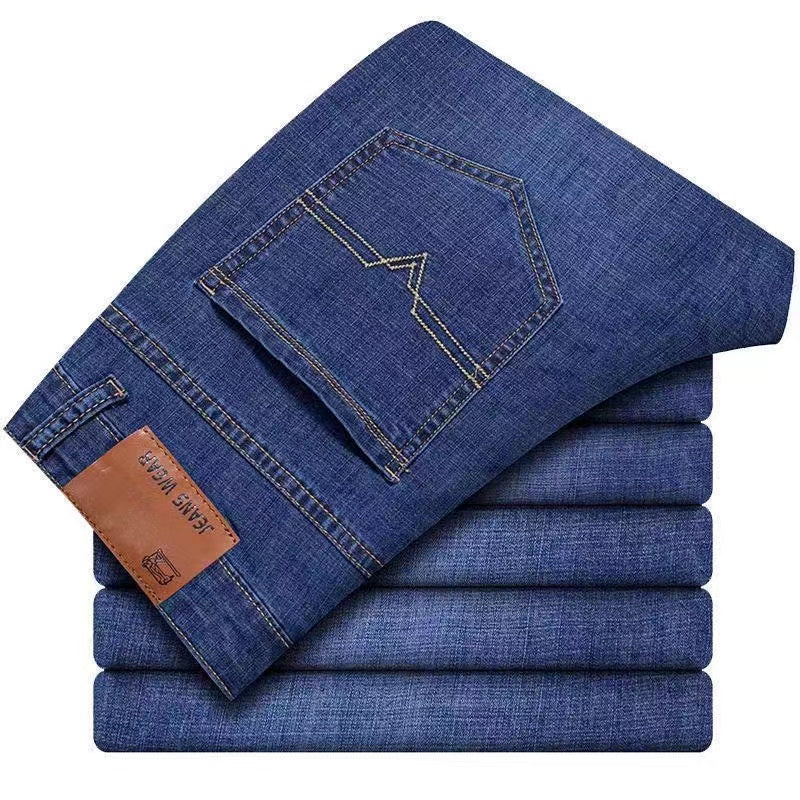 Summer men's elastic jeans for construction work, loose-fitting straight-leg casual and versatile durable trousers.
